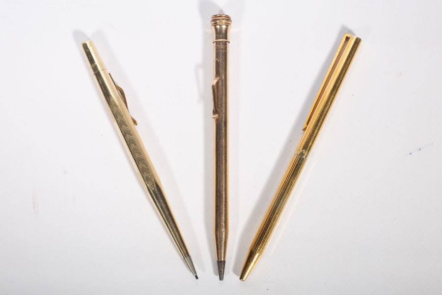 A 925 stamped gold plated roller ball pen by DuPont Du Paris, along with two rolled gold