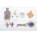 A collection of vintage and antique jewellery to include items of silver and gilded jewellery.
