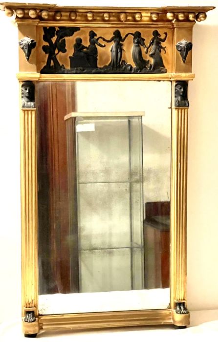 A 19th century gilt and ebony painted looking glass mirror.