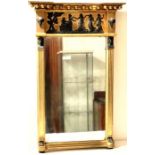 A 19th century gilt and ebony painted looking glass mirror.