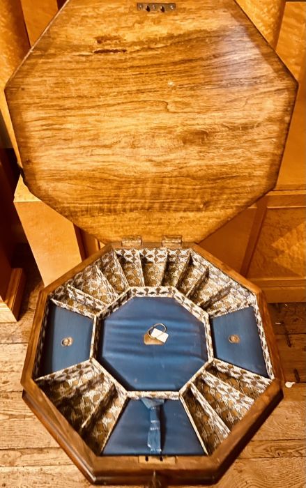 A Victorian walnut and marquetry games table, circa 1850, octagonal top with a lid encloses interior - Image 2 of 2