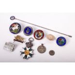 A collection of enamelled militaria and coins to include a Napoleonic Legion D'Honneur medal,