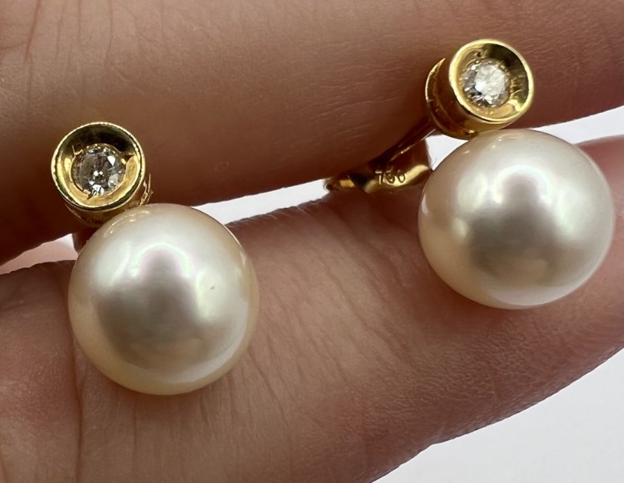 A pair of 18ct gold cultured pearl and diamond ear studs. The pearls measure approximately 8mm. - Image 3 of 3