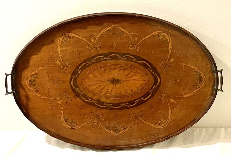 A Thomas Sheraton revival mahogany, satinwood and marquetry strung twin handle tray, wavy full