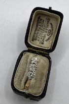 An 18ct three stone diamond ring. Total diamond weight approximately 0.5ct, approximate gross