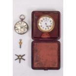 An unusual Victorian key wound sterling silver pocket watch, featuring a silvered dial with a