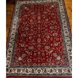 An early 20th century Iranian design Tabriz woven rug, made in Belgium.