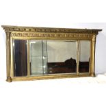 A regency and later gilt over mantle mirror.