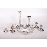 A selection of tablewares comprising a sterling silver pierced work bonbon dish, a sterling silver