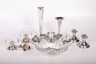 A selection of tablewares comprising a sterling silver pierced work bonbon dish, a sterling silver
