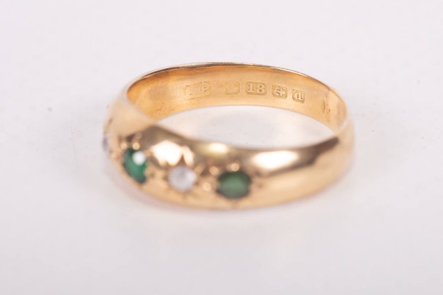 An Edwardian gypsy set 18ct gold ring featuring green and white stones, along with an early 20th - Image 3 of 5