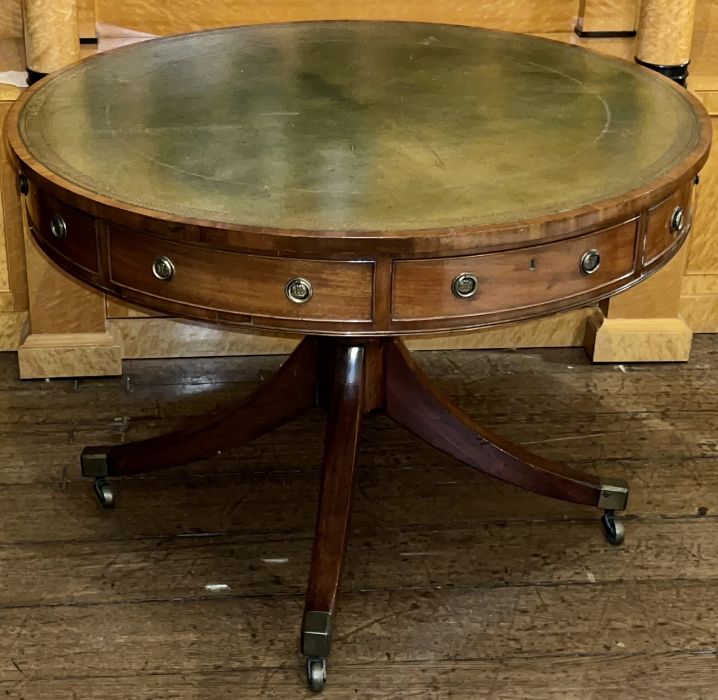 A Regency and later mahogany and leather inlay drum table, circa 1810 with later additional