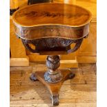 An early Victorian walnut and satinwood strung jewellery table, in a kidney shape, a hinged top