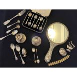 A selection of sterling silver tableware to include a cased set of six teaspoons, two short loaded