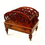 A William IV rosewood Canterbury, circa 1835, four section scroll divisions, united by turned