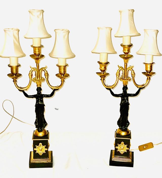 A pair of empire style candlesticks (2)