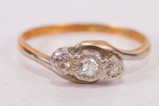 An early 20th century diamond trilogy ring, in yellow metal stamped 18ct Plat. Gross weight