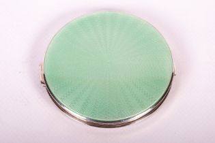 A pale green guilloche enamel topped compact in sterling silver Hallmarked for Adie Brothers Ltd,