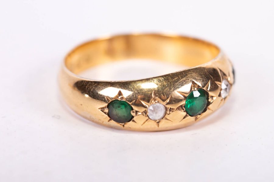 An Edwardian gypsy set 18ct gold ring featuring green and white stones, along with an early 20th - Image 2 of 5