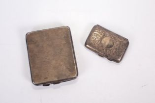 A pair of sterling silver cigarette cases. The larger measuring approximately 10.3cm x 8.6cm x 1.