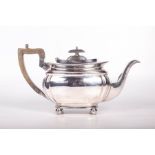 An oblong form George V silver teapot, hallmarked for Mark Willis & Son, Sheffield 1911. Gross