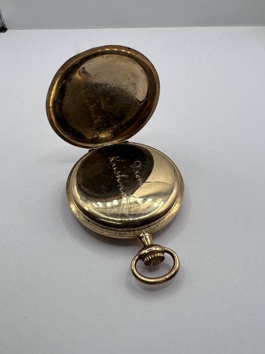A slimline 9ct yellow gold pocket watch, untested but runs when wound. London import hallmark for - Image 3 of 3
