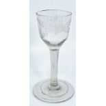 A late 18th century wine glass the bowl engraved with rose and foliage alluding to Jacobite