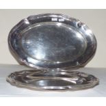 A plated Swedish shaped oval meat dish with raised reeded border, 41.5cm wide and a similar shaped