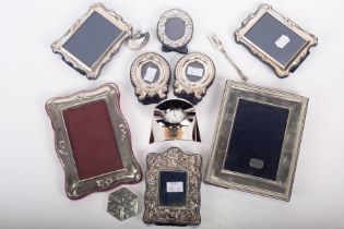 A selection of silver and other white metal items, featuring a hexagonal sterling silver pill box,