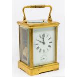 A French Grand sonnerie carriage clock with carrying case and with repeat and alarm. Two-train