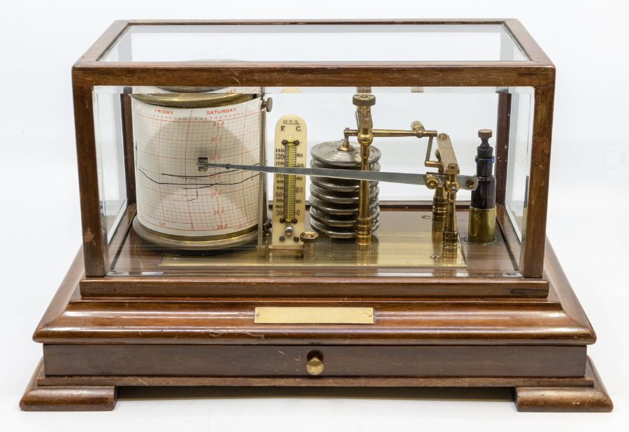 A cased barograph/weather station together with charts, thermometer and ink. In a mahogany case with