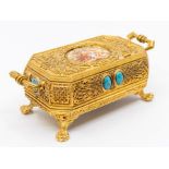 A Singing Bird musical box, automata in a gilt case. Clockwork mechanism inside a gilt case with