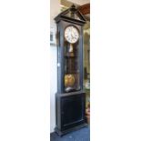 A good floor standing Vienna clock with eight day single train weight driven movement. With 10"