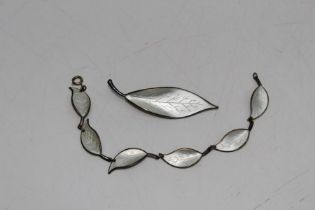 A David Anderson white enamel and silver leaf brooch and bracelet