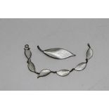 A David Anderson white enamel and silver leaf brooch and bracelet