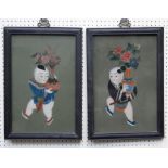 A pair of late 19th/early 20th century Chinese paintings on glass, each depicting a child carrying a