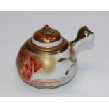 A 20th century Japanese kutani-type porcelain teapot and cover decorated in iron red and gilt with