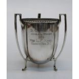 A three handled sterling silver engraved cup, approximate weight 229gm