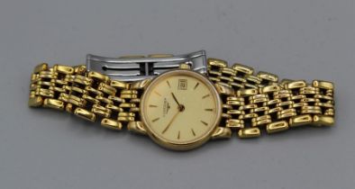 A yellow coloured stainless steel Longines watch, Les Grands Classique de Longines. Untested but