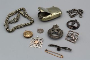 A selection of gold and silver jewellery along with other interesting items, including a 9ct back