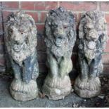 Three nicely weathered reconstituted stone lions, each modelled seated upon hind paws with open