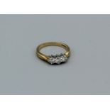 An 18ct threestone diamond ring, 3.8gm approx