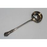 A sterling silver ladle, Kings pattern, hallmarked for London, 1854. Partial sponsors stamp W in
