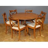 A small, good quality reproduction yew veneer tilt top breakfast table together with a set of six