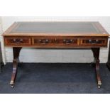 A good reproduction burr yew veneer writing desk, the rectangular top set with gilt tooled green