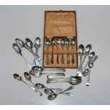 Twenty seven silver teaspoons, six in fitted case. Approximately 499gm