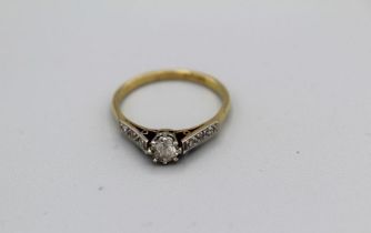 A diamond engagement ring set with a central old cut diamond estimated 0.33ct diamond (although it
