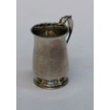 Asprey and Co. Ltd, a George VI silver tankard of baluster form with leaf capped scrolled handle