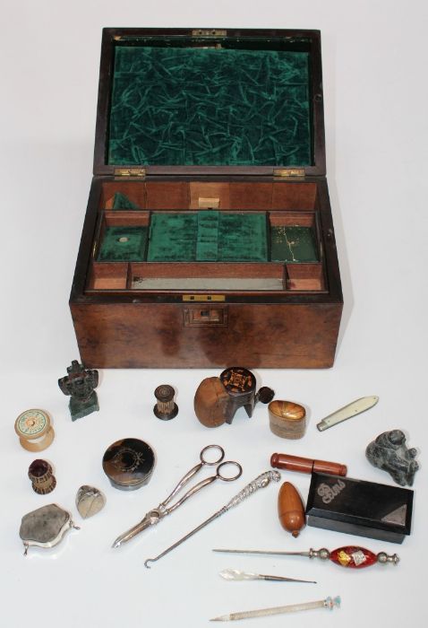A Victorian walnut needlework/jewellery box containing various collector's items including straw