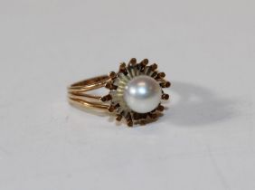 A cultured pearl ring, yellow metal, size E, 3gms gross approx, unmarked